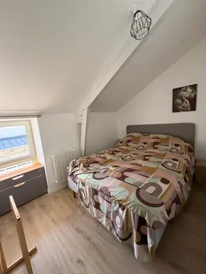Un ou plusieurs lits dans un hébergement de l'établissement Comme à la maison