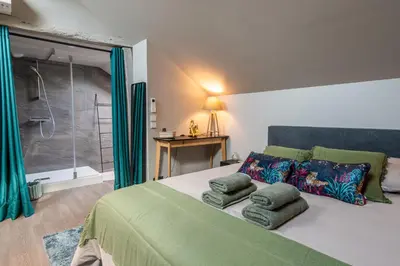 Un ou plusieurs lits dans un hébergement de l'établissement Résidence Saint-Louis - Appart'Hôtel tout-équipé
