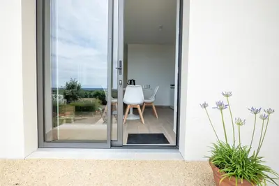 Balcon ou terrasse dans l'établissement Le Hameau des Lys - 12min du PuyduFou