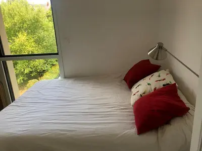 Un ou plusieurs lits dans un hébergement de l'établissement New and spacious appartment 1 room St Mihiel