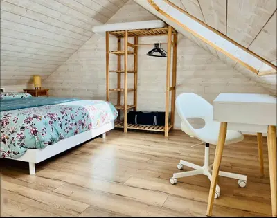 Un ou plusieurs lits dans un hébergement de l'établissement Charmante maison avec jardin dans le cœur de Savennières