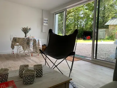 Coin salon dans l'établissement Logement T2 et Véritable écrin de verdure en ville