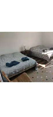 Un ou plusieurs lits dans un hébergement de l'établissement Maison Pornic a 300m de la plage