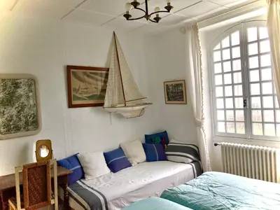 Un ou plusieurs lits dans un hébergement de l'établissement Grande maison face à l'océan