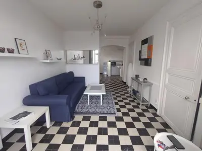 Coin salon dans l'établissement Charmant appartement Pornic