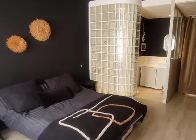 Un ou plusieurs lits dans un hébergement de l'établissement Chambre avec entrée Privée au calme, quartier Talensac
