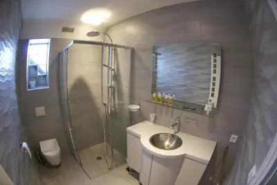 Salle de bains dans l'établissement Gîte La Terrasse Du Verger