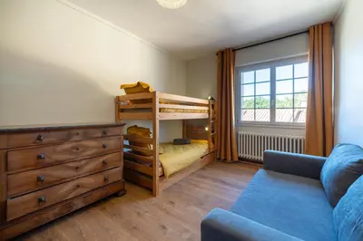 Coin salon dans l'établissement La Maison du Bonheur - Grand Jardin