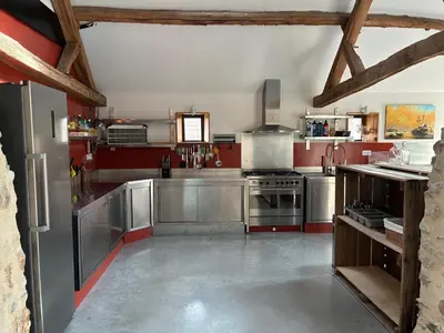 Cuisine ou kitchenette dans l'établissement Maison familiale