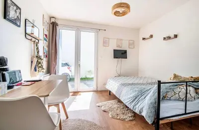 Un ou plusieurs lits dans un hébergement de l'établissement Studio Les Cèdres, central et chaleureux !