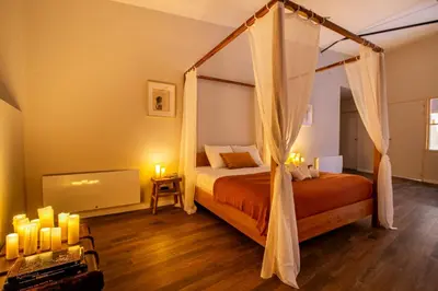 Un ou plusieurs lits dans un hébergement de l'établissement L'Attirance, Loft de Charme !