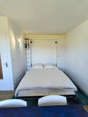 Un ou plusieurs lits dans un hébergement de l'établissement Les Goélettes - Studio avec terrasse vue mer