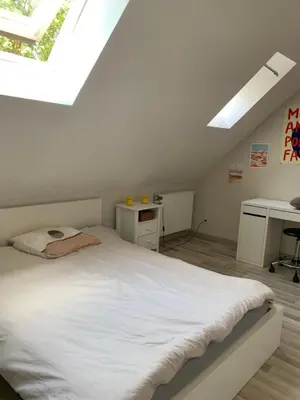 Un ou plusieurs lits dans un hébergement de l'établissement Maison L