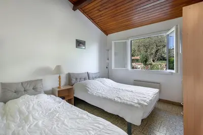 Un ou plusieurs lits dans un hébergement de l'établissement 800 m de la plage, jardin, maison pour 5