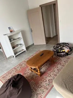 Coin salon dans l'établissement Appartement meublé tout équipé - Mesnard-La-Barotière