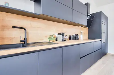 Cuisine ou kitchenette dans l'établissement Plage à 400 m - Maison pour 4 avec terrasse