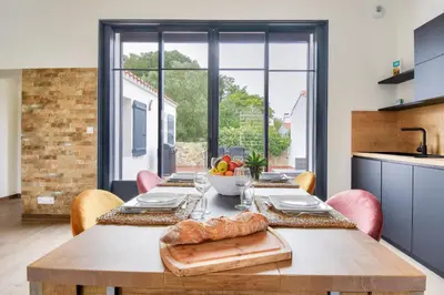 Coin salon dans l'établissement Plage à 400 m - Maison pour 4 avec terrasse