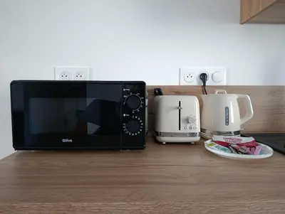 Cuisine ou kitchenette dans l'établissement Charmant Studio à St Marc Sur Mer
