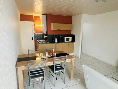 Cuisine ou kitchenette dans l'établissement Appartement à la mer