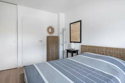 Un ou plusieurs lits dans un hébergement de l'établissement Appartement proche plage et bourg