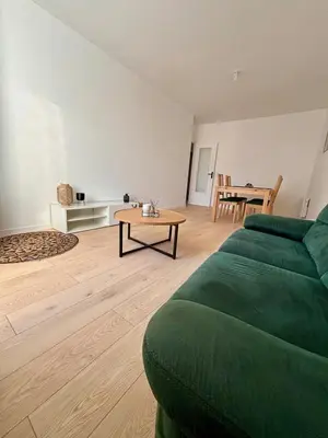 Coin salon dans l'établissement Charmant appartement tout confort