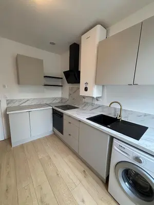 Cuisine ou kitchenette dans l'établissement Charmant appartement tout confort