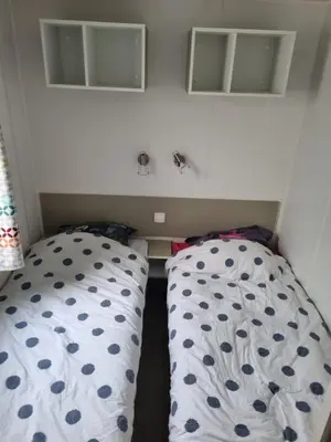 Un ou plusieurs lits dans un hébergement de l'établissement MH300 le clarys camping 5 étoiles