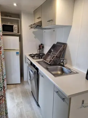 Cuisine ou kitchenette dans l'établissement MH300 le clarys camping 5 étoiles