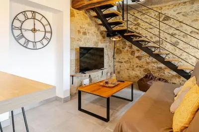 Télévision ou salle de divertissement dans l'établissement L'Atelier Jolie maison de charme proche Puy duFou