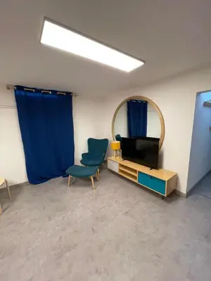 Télévision ou salle de divertissement dans l'établissement Underground appart