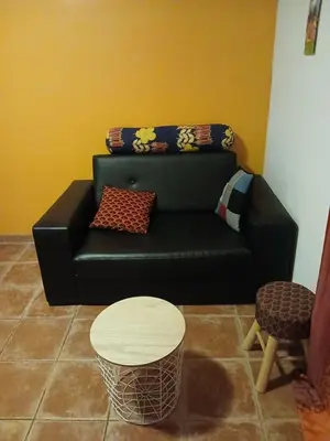 Coin salon dans l'établissement Appartement Cosy