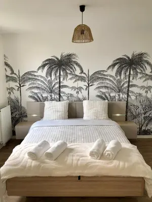 Un ou plusieurs lits dans un hébergement de l'établissement La suite Gariguette-parking privé-balcon