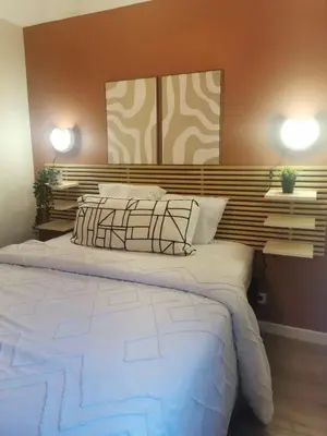 Un ou plusieurs lits dans un hébergement de l'établissement Beautiful cocooning appartement