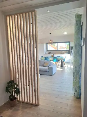 Coin salon dans l'établissement La Dunette - Maison avec spa extérieur