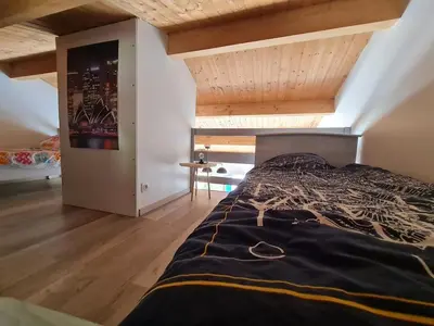 Un ou plusieurs lits dans un hébergement de l'établissement Maison avec Piscine Chauffée, Proche Mer et Commerces, pour 4/5 Pers., Animaux Admis - FR-1-777-22