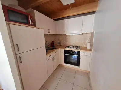 Cuisine ou kitchenette dans l'établissement Maison avec Piscine Chauffée, Proche Mer et Commerces, pour 4/5 Pers., Animaux Admis - FR-1-777-22