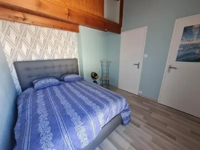 Un ou plusieurs lits dans un hébergement de l'établissement Maison avec Piscine Chauffée, Proche Mer et Commerces, pour 4/5 Pers., Animaux Admis - FR-1-777-22