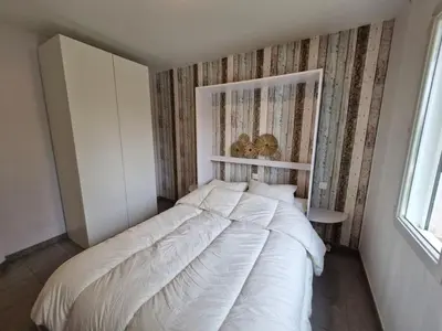 Un ou plusieurs lits dans un hébergement de l'établissement Maison à Saint-Jean-de-Monts avec piscine et WiFi, pour 6 personnes - FR-1-777-41