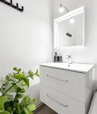 Salle de bains dans l'établissement Appartement cosy, plage et parking privé