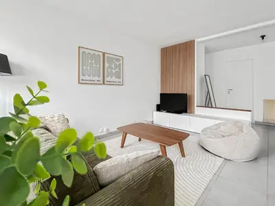 Télévision ou salle de divertissement dans l'établissement Appartement cosy, plage et parking privé