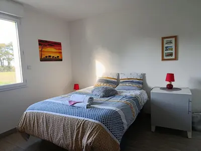 Un ou plusieurs lits dans un hébergement de l'établissement Chambre à la campagne entre Nantes et Rennes