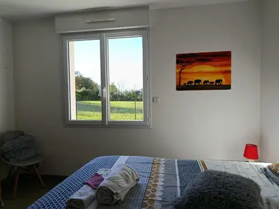 Un ou plusieurs lits dans un hébergement de l'établissement Chambre à la campagne entre Nantes et Rennes