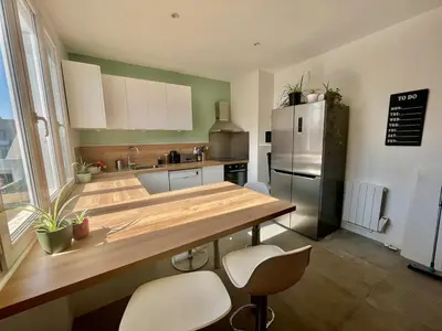 Cuisine ou kitchenette dans l'établissement Appartement cosy proche Nantes