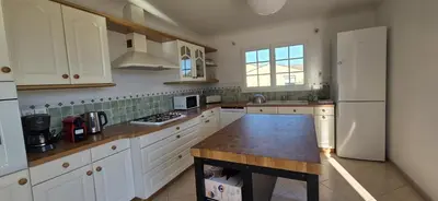 Cuisine ou kitchenette dans l'établissement gîte house in Vallet