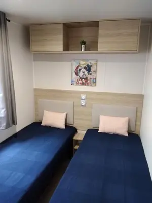 Un ou plusieurs lits dans un hébergement de l'établissement MOBILHOME - 6 personnes - 40 m2