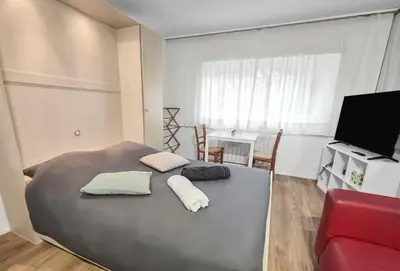 Un ou plusieurs lits dans un hébergement de l'établissement Studio cosy proche Nantes - parking