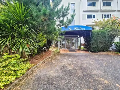 Jardin de l'établissement Studio cosy proche Nantes - parking