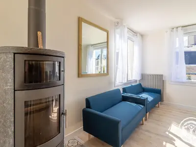 Coin salon dans l'établissement Gîte familial pour 8 pers. à Saint Aubin de Luigné - FR-1-622-117