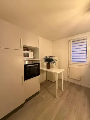 Cuisine ou kitchenette dans l'établissement Le Monde des Dunes - T3 - Parking privé