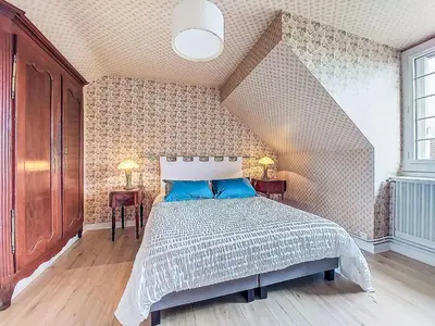 Un ou plusieurs lits dans un hébergement de l'établissement Holiday Home Les Goganes by Interhome